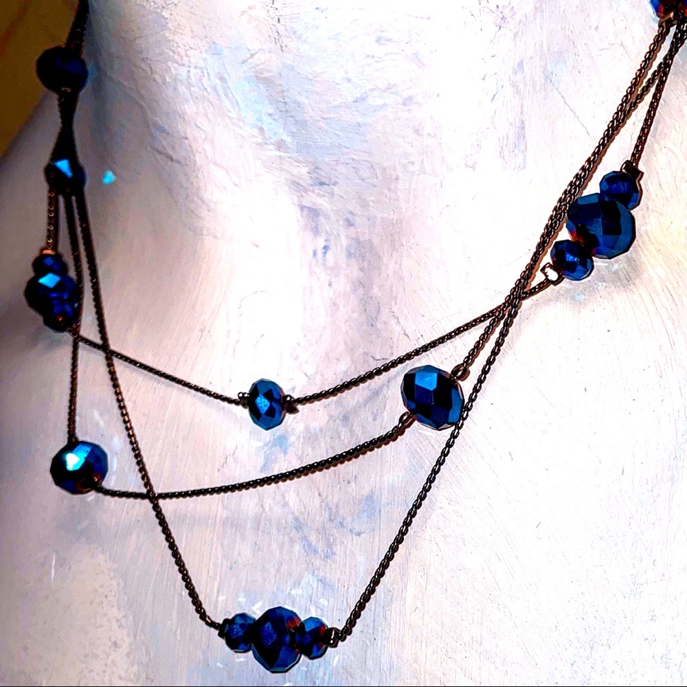 Iridescent faceted blue crystal and silver three tiered  necklace